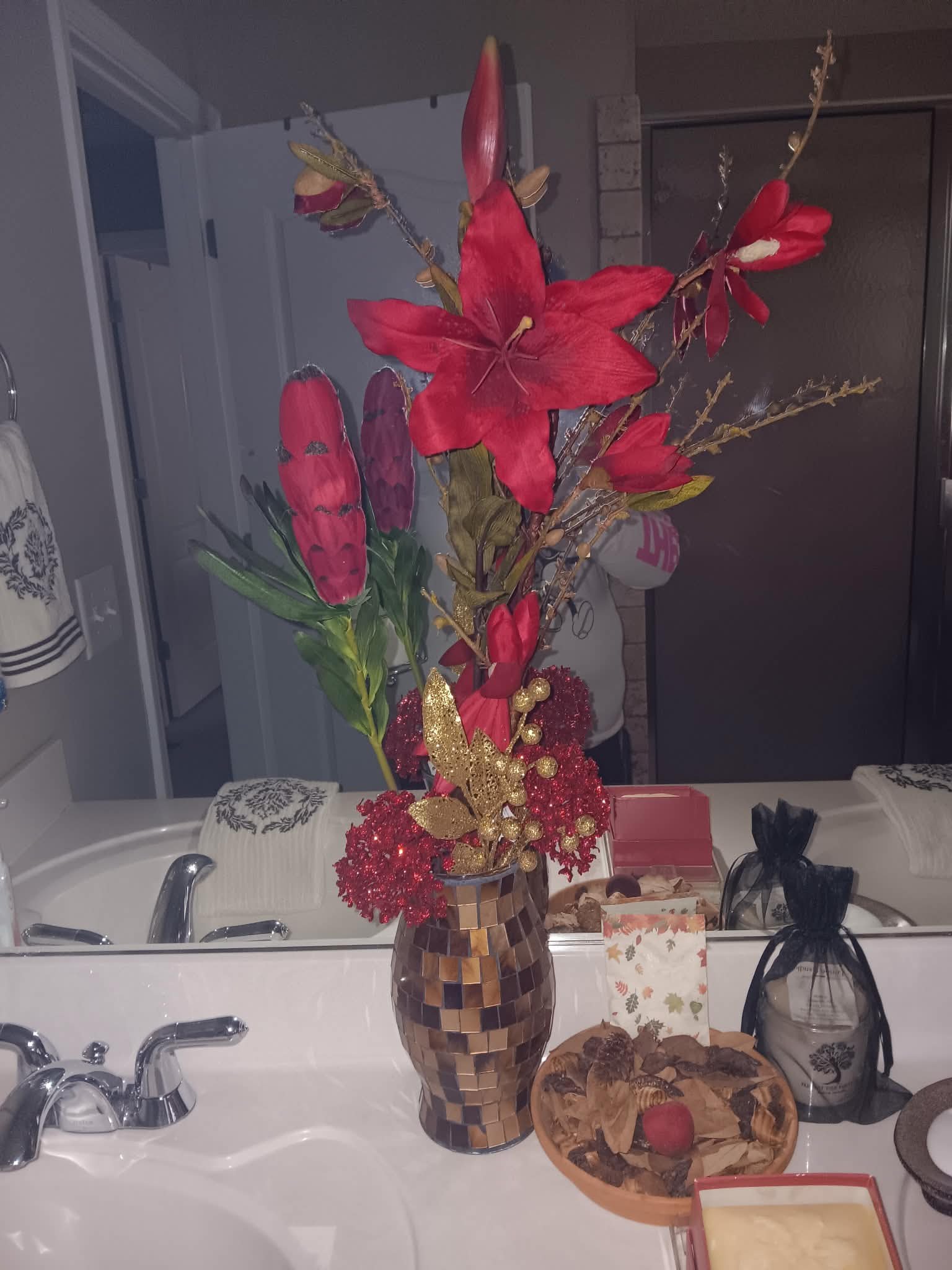Bathroom with floral arrangement