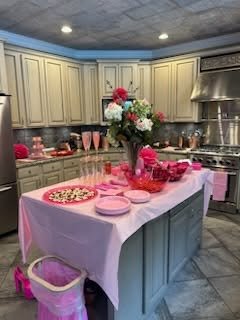 Kitchen party setup with florals