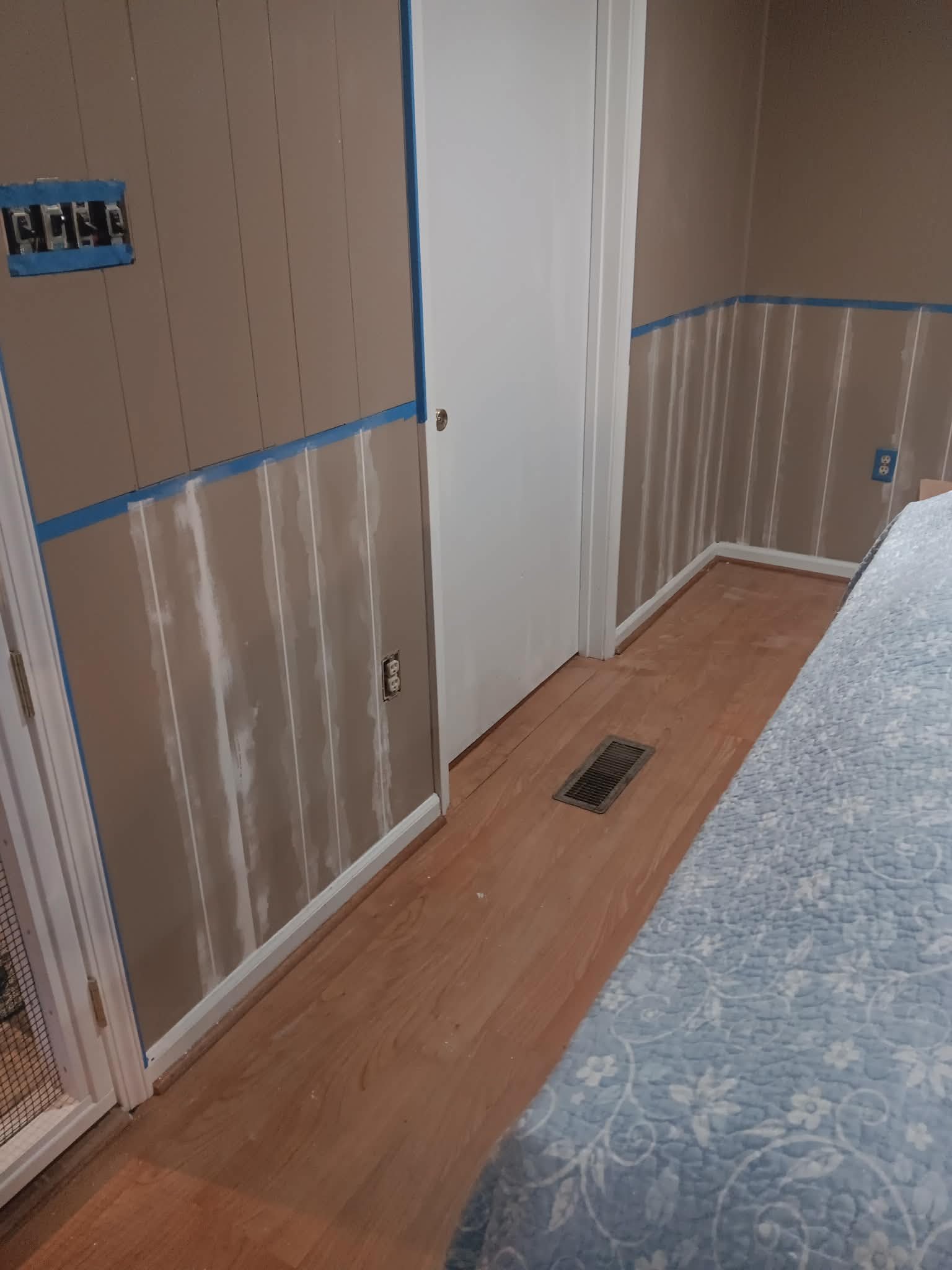 Before — wall being prepped for wallpaper